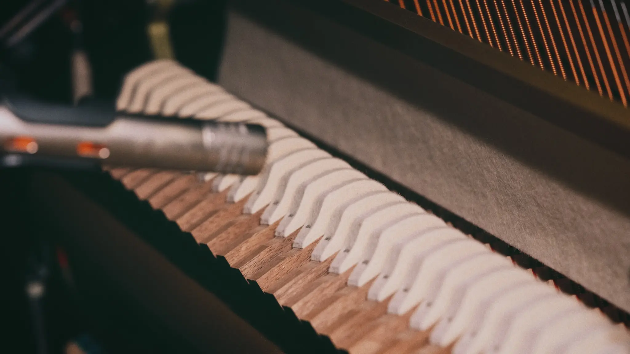 a picture of recording an upright felt piano